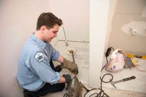 Image clog drain auger cleaning