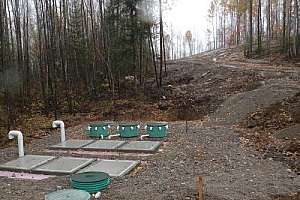 An Rv Dump Station Utilizing Secondary Treatment Prior To Mound System At The Top Of The Hill Large